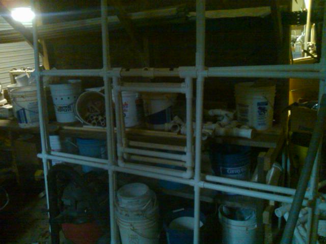 Plumbing side of the workbench with more of the GH roof glued up.jpg