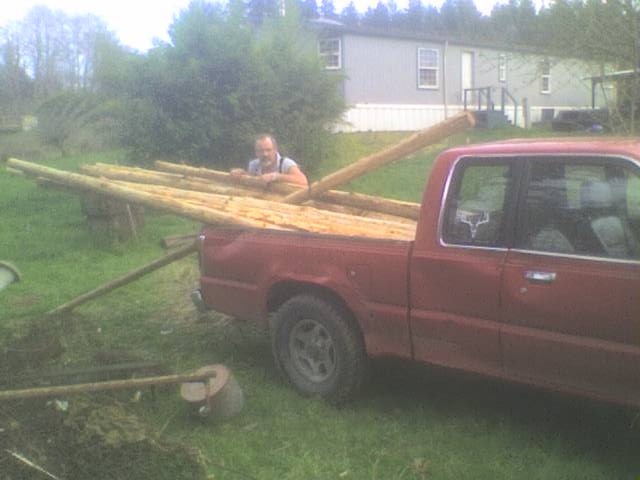 cedarpolesintruck.jpg