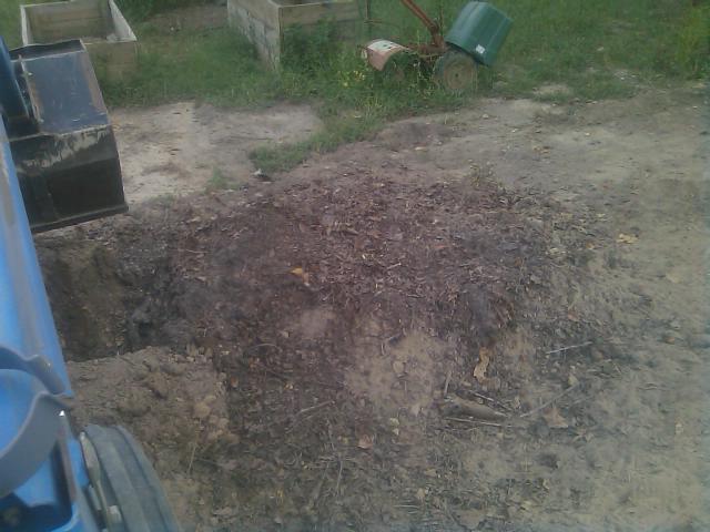 9-13-2011 Making more raised beds - hole in the middle.jpg