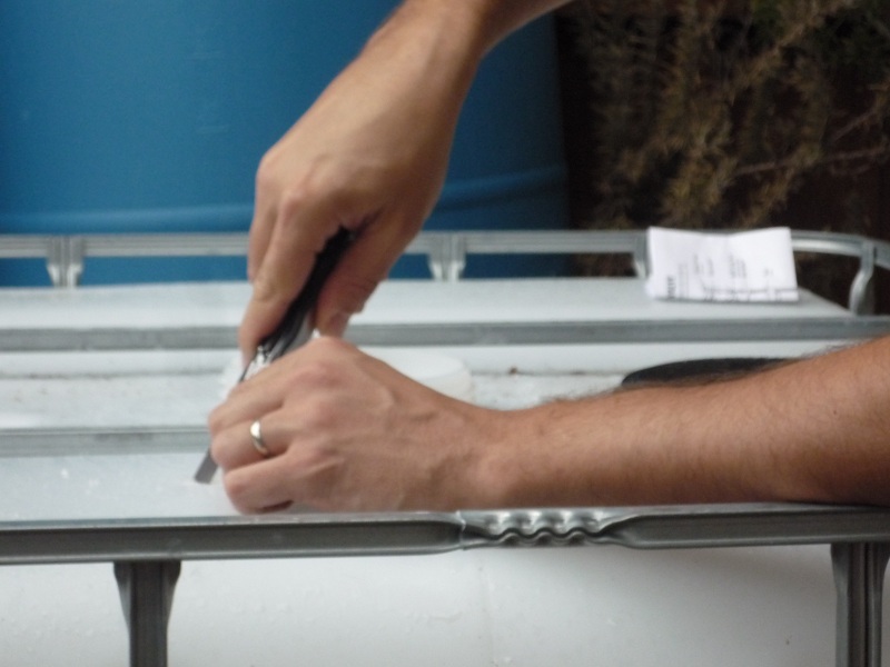 004 cleaning up the drill holes.jpg