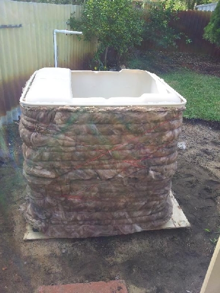 Fish tank IBC wrapped in insulation.jpg