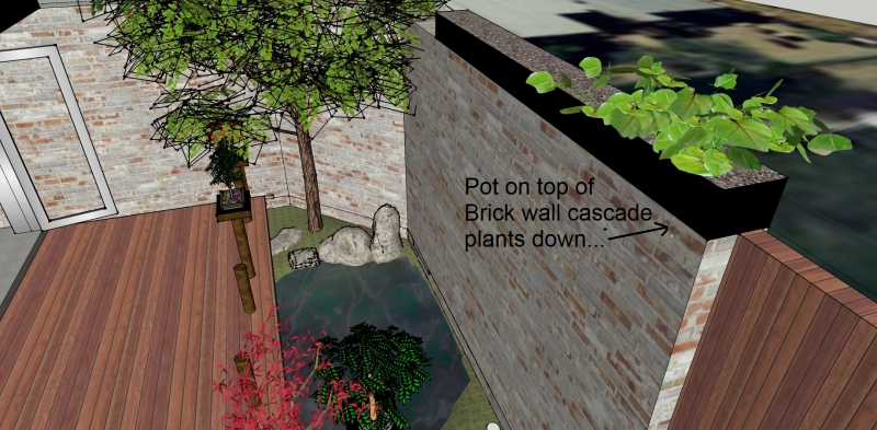 Trickle pot on brick wall.jpg