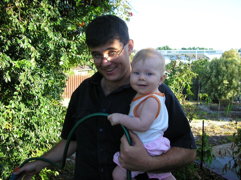 Dad and tori watering.jpg