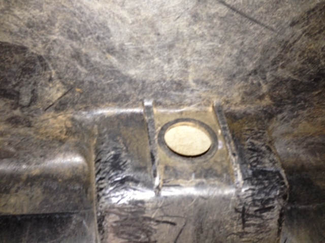 stock tank drain hole.jpeg