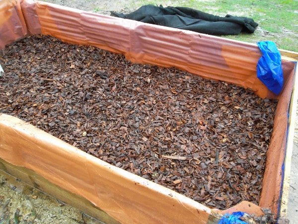 Filling with wood chips.jpg