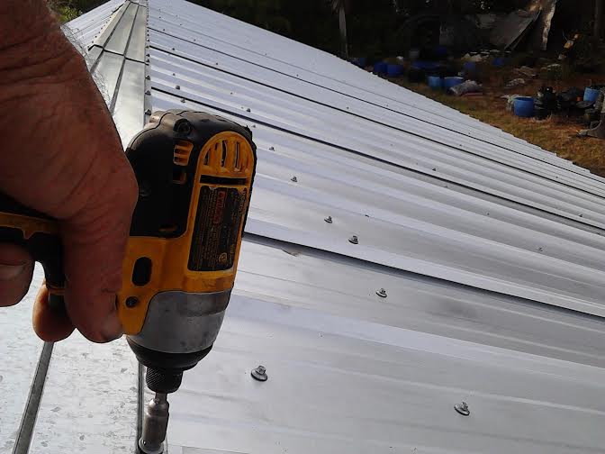 FH roof last screw 12-11.jpg