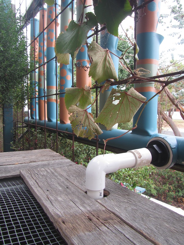 Grow tower collection pipe inflow to fish tank.jpg