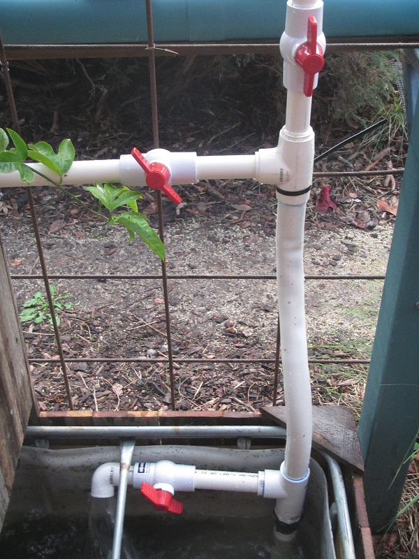 Flow split 3 ways - up to towers, across to fish tank, excess back to sump.jpg