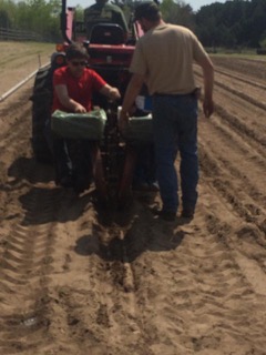 Justyce and Nate Transplanting.jpeg
