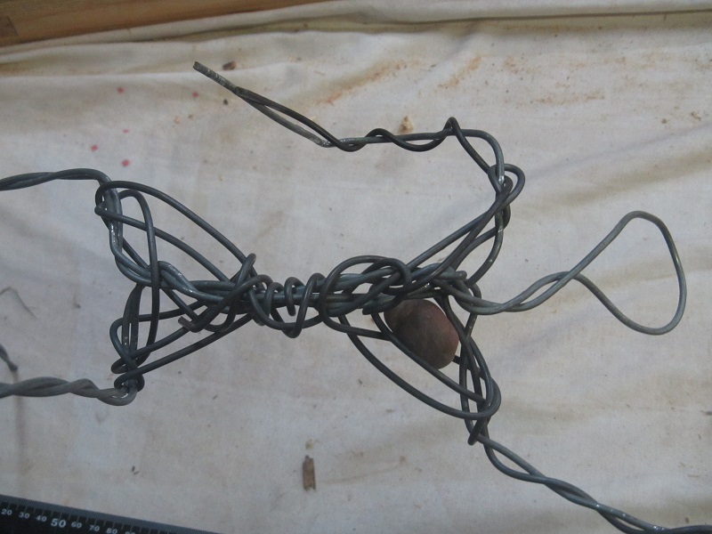 In the beginning - a rose quartz heart and a fencing wire skeleton.jpg
