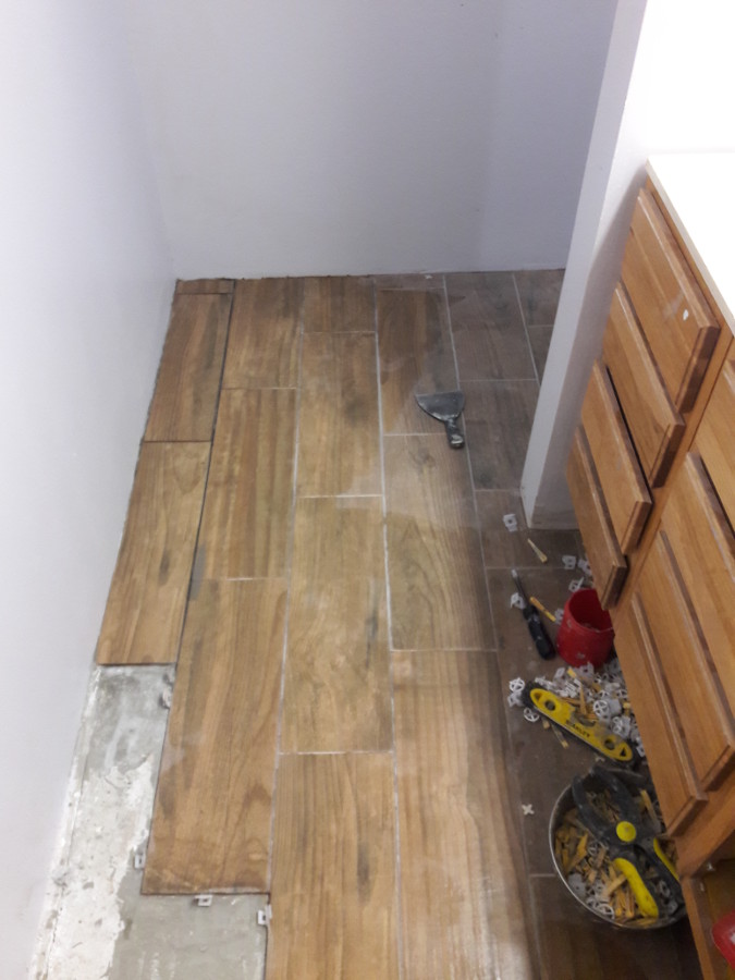 Jan-19-2018-working-tile-in-powder-room.jpg