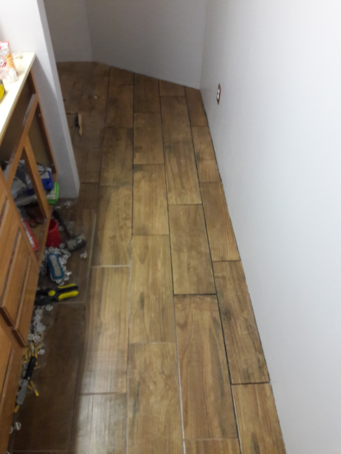 Jan-20-2018-Almost finished-tiling-in-Powder-room-north.jpg