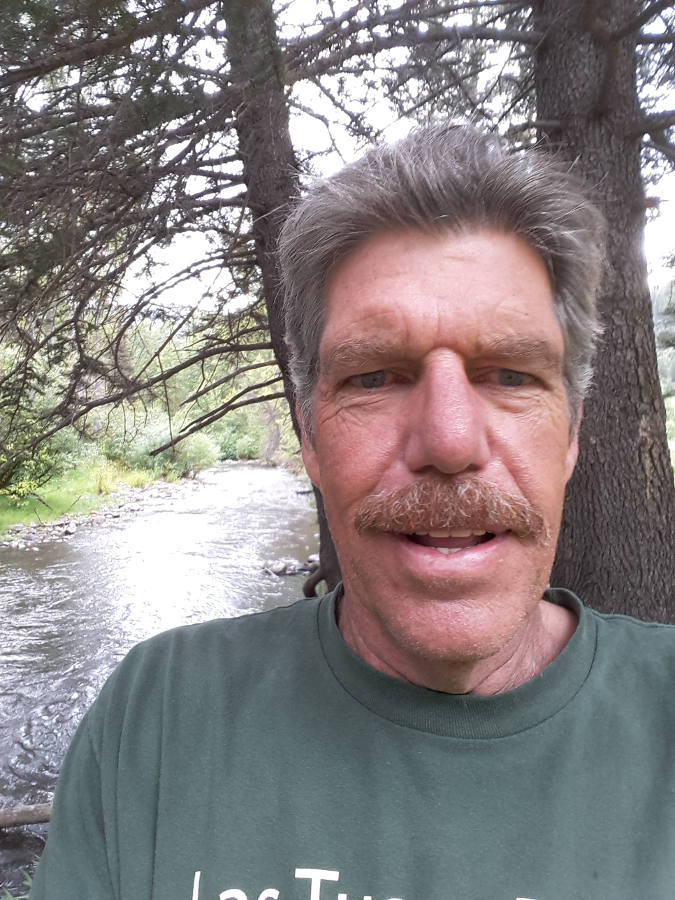 Taos-health-happiness-trip-Selfie-rain-river.jpg