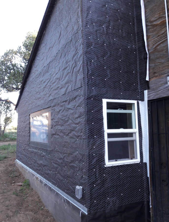 Siding-Stucco-backing-three-layers-plus-netting.jpg