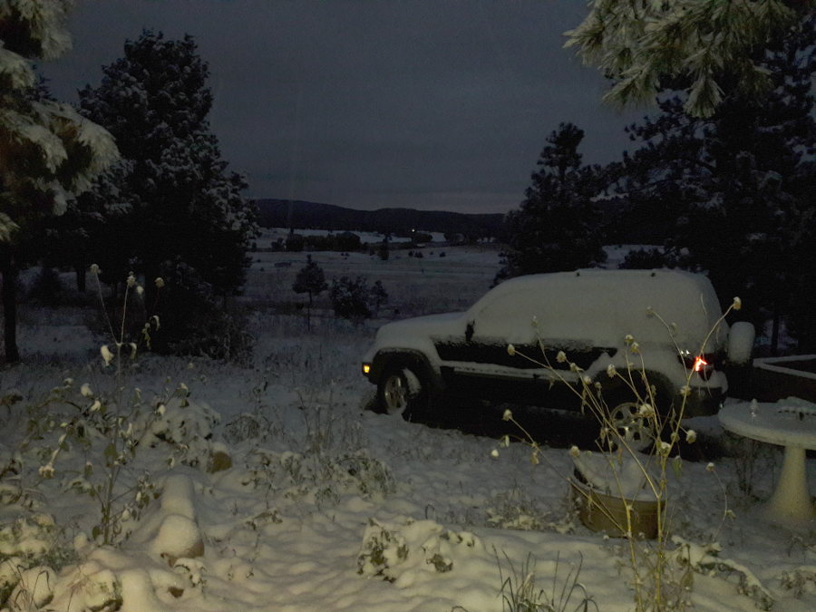 First-Snow-October-14th-2018-backyard-Jeep-trailer-covered.jpg