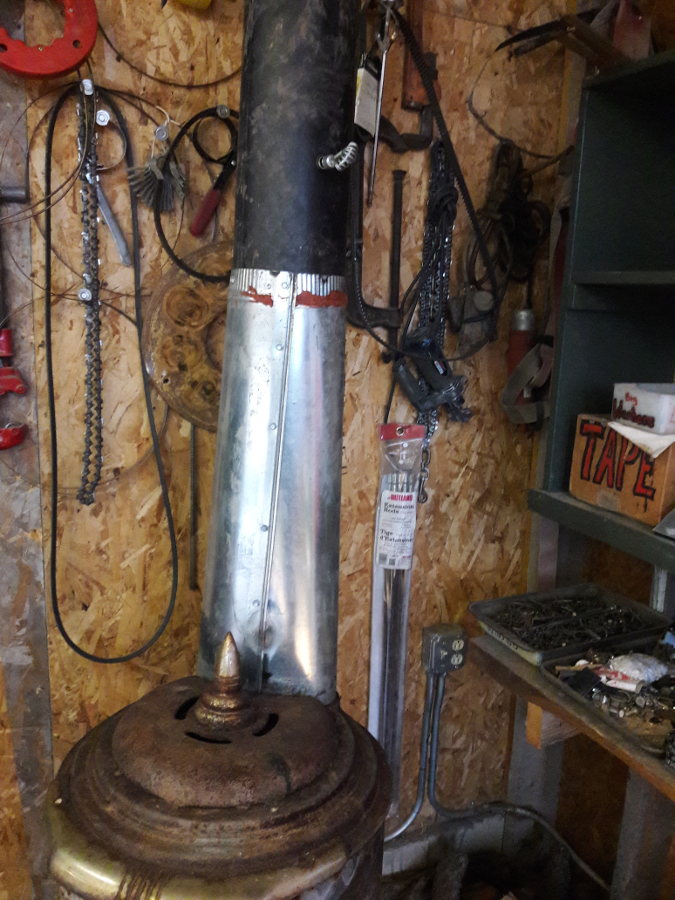 Pot-bellied-stove-installed-in-shop-missing-stove-pipe-adapter-Brians-mod-Oct-23rd-2018.jpg